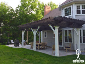 Pergola with white columns and brown top, Bedford NH