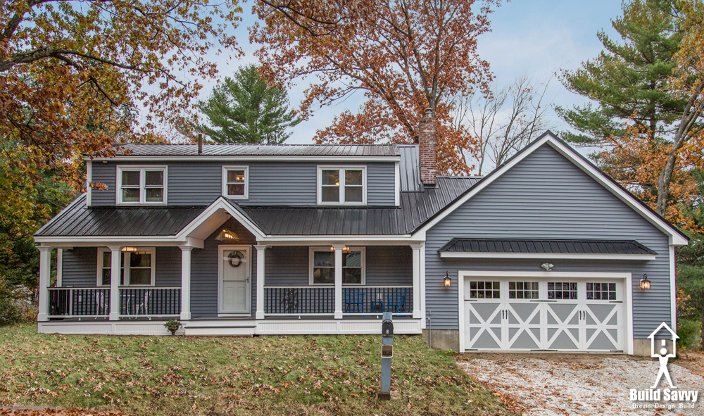 Custom Garage in Nashua, NH on dark grey house with metal roof