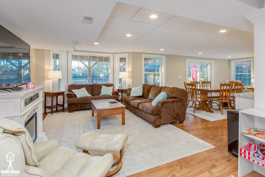 Finished Basement in Bedford NH with kitchen table and entertainment living room area